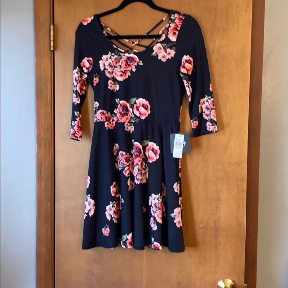 by by  black with pink flowers. New with tags.